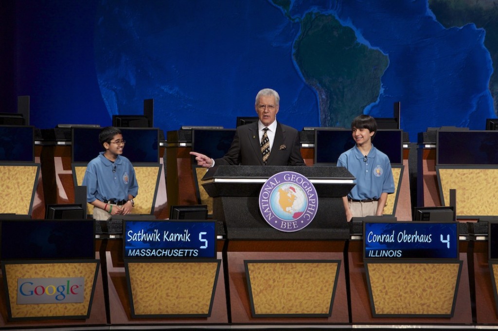 National Geographic Bee moderator Alex Trebek, along with 2013 Bee champion Sathwik Karnik of Massachusetts (left) and  runner-up Conrad Oberhaus of Illinois. Trebek received the National Geographic Society's Alexander Graham Bell Medal at the National Geographic 125th Anniversary Gala Awards. © Rebecca Hale/National Geographic