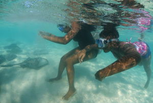 Students in Bimini, The Bahamas meeting Southern stingrays (c) Jillian Morris 